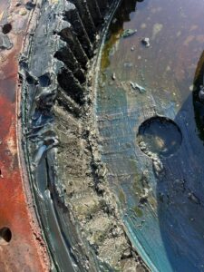 Worn Excavator Component